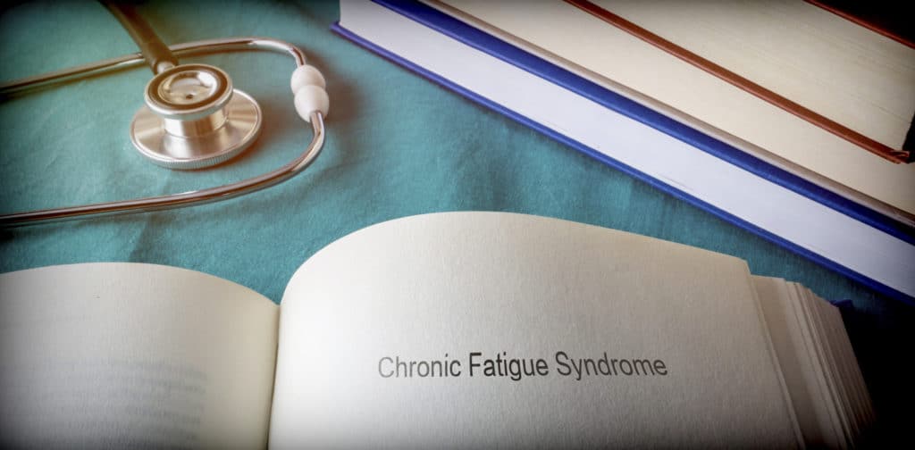 chronic fatigue syndrome words printed on a book page